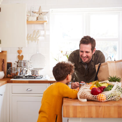 Father and son in kitchen